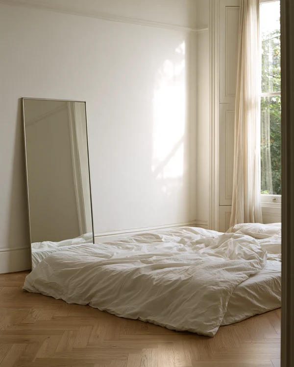 Minimalist Bedroom with Mirror and Floor Bed