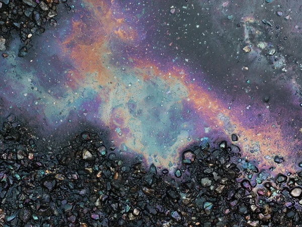 Iridescent Oil Sheen on Wet Asphalt