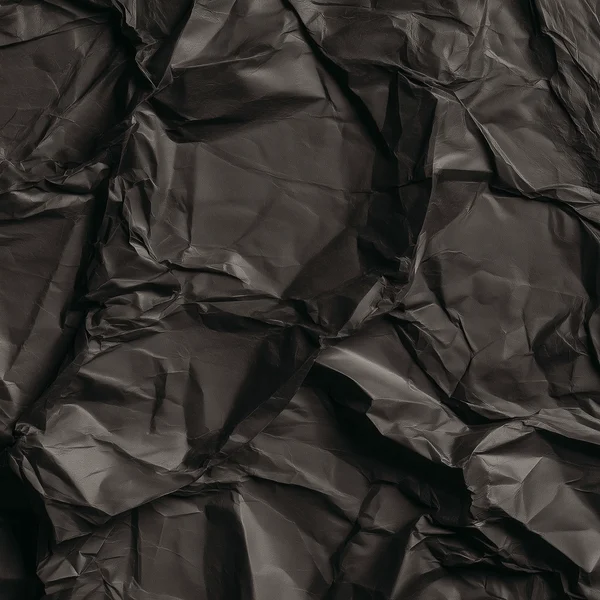 Crumpled Dark Paper Surface