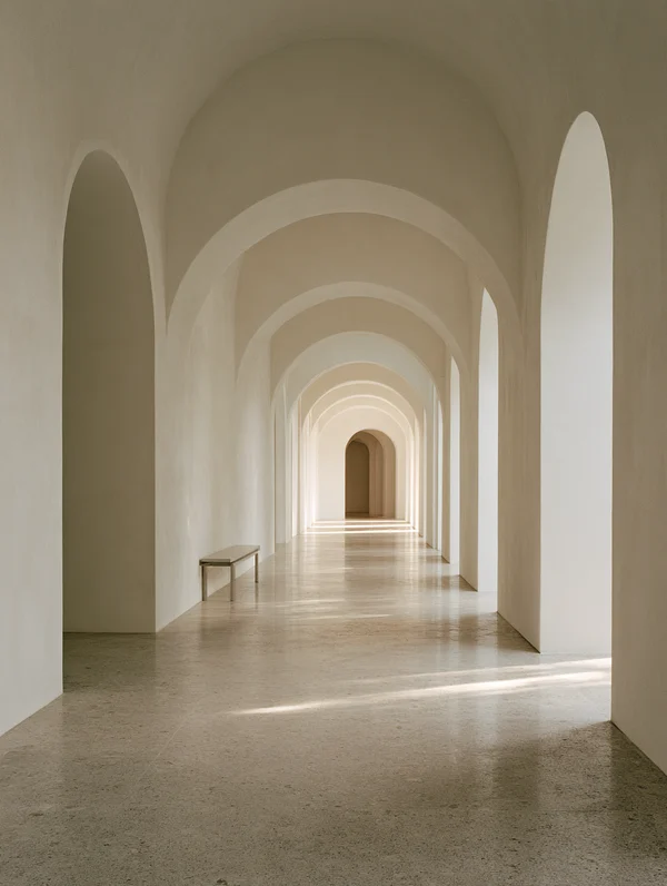 Minimalist Corridor with Arched Passageways