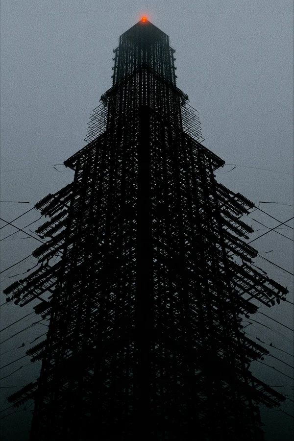 Lattice Transmission Tower in Fog
