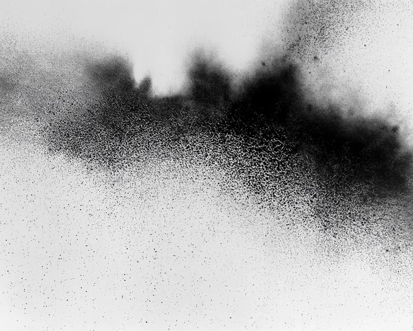 Abstract Black Ink Splatter on White Paper