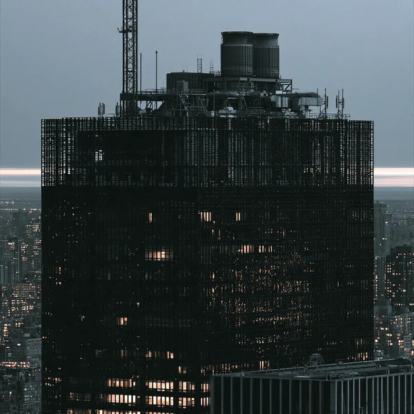Skyscraper at Dusk in a Dense Urban Skyline