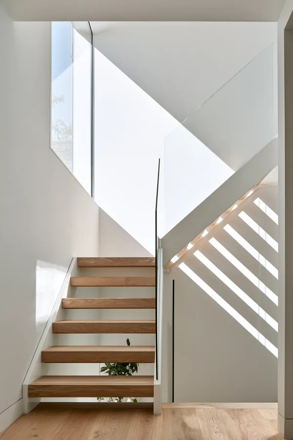 Minimalist Wooden Staircase with Glass Railing