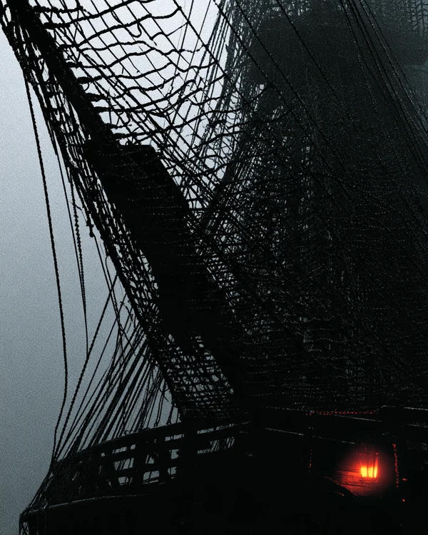 Silhouette of a Tall Ship in the Mist