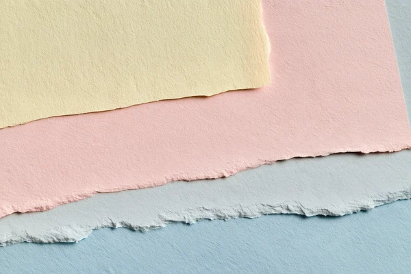 Layered Pastel Paper Sheets