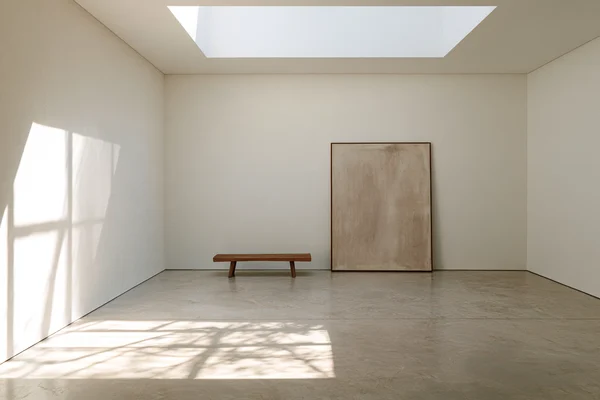 Minimalist Gallery Space with Wooden Bench