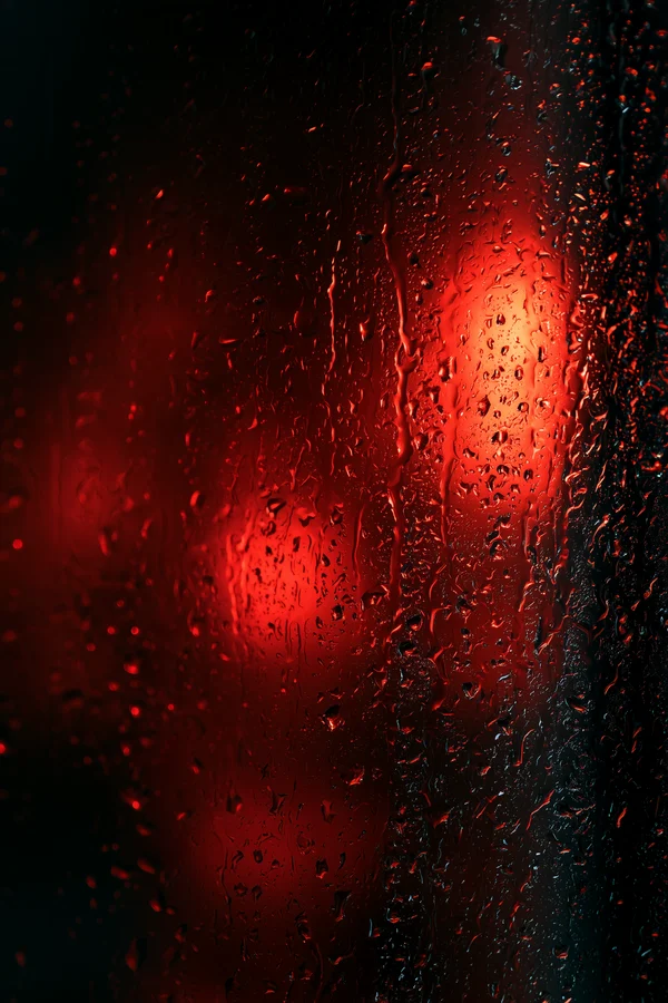 Raindrops on Dark Glass