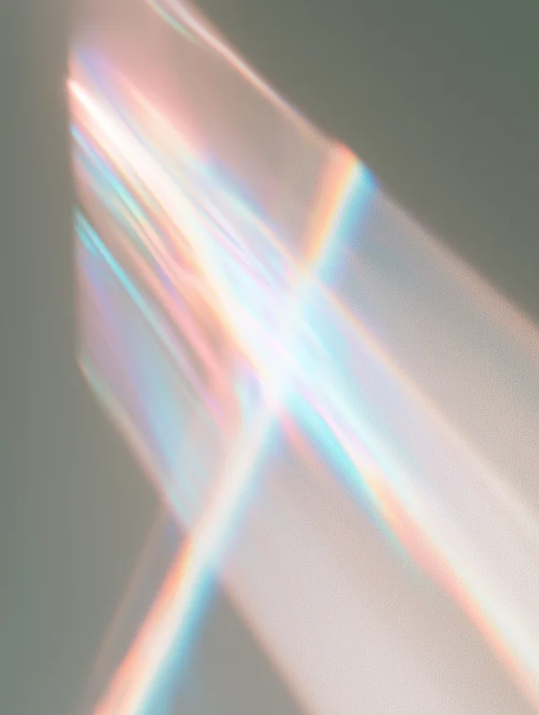 Prismatic Light Reflections on Wall