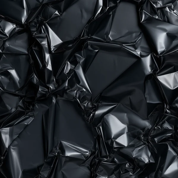 Crumpled Black Foil Surface